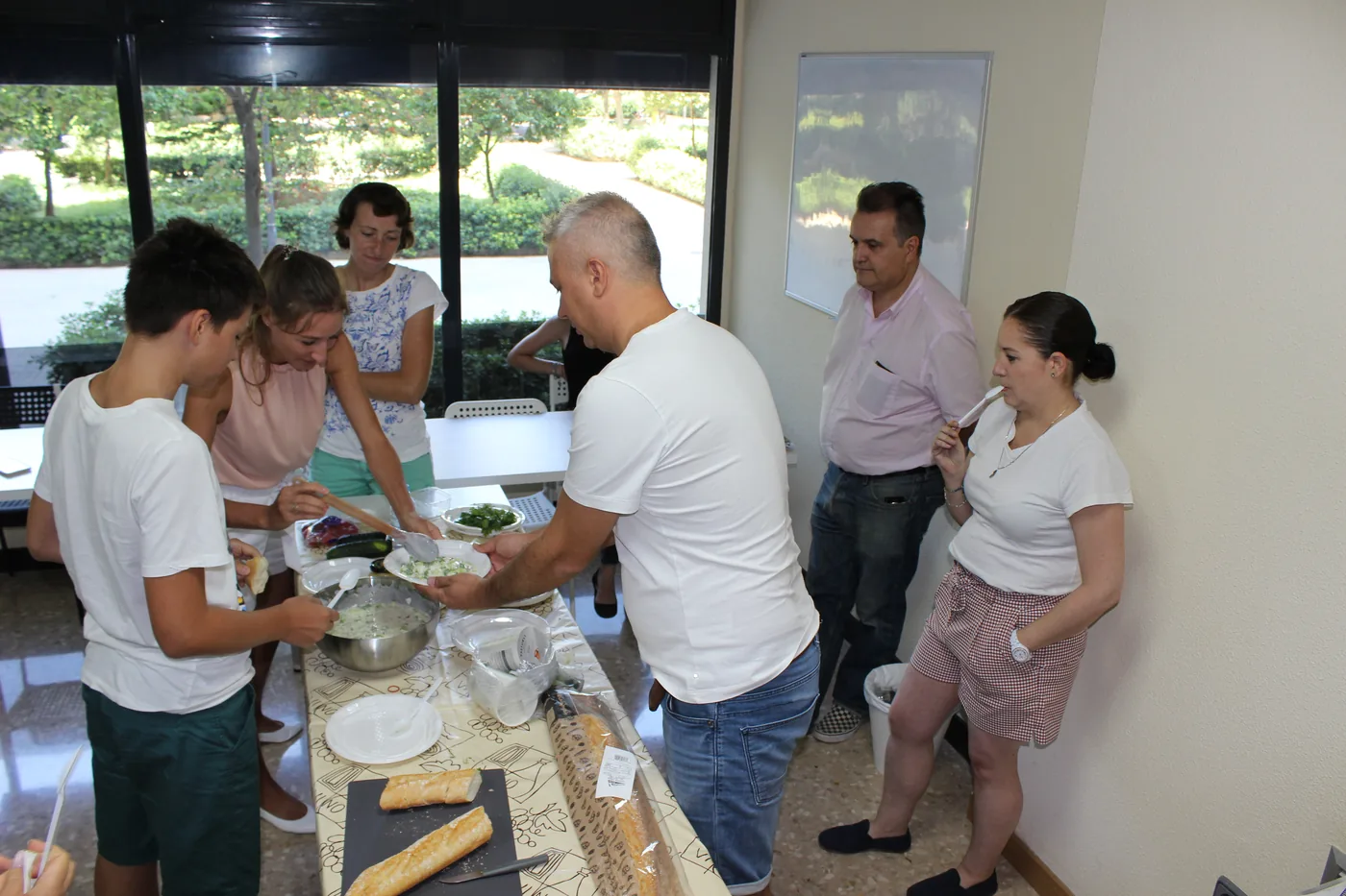 Spanish cooking workshop, students preparing food together